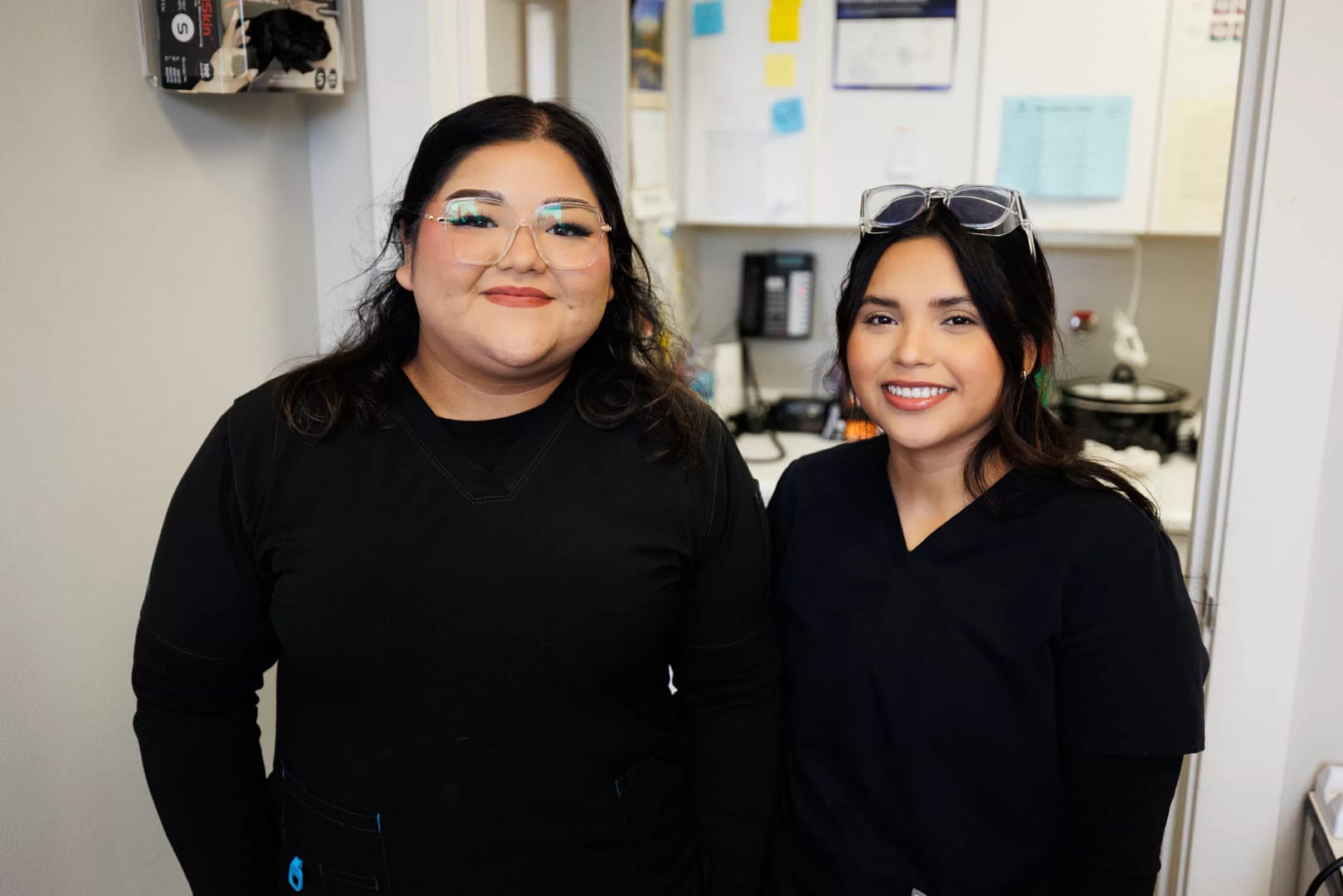 Dental assistants smile for a picture at Premier Dental Center in Ferndale, Washington new patients